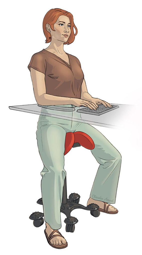 Tietokoneella työskentelevä ryhdikäs punahiuksinen nainen istuu satulatuolilla. 